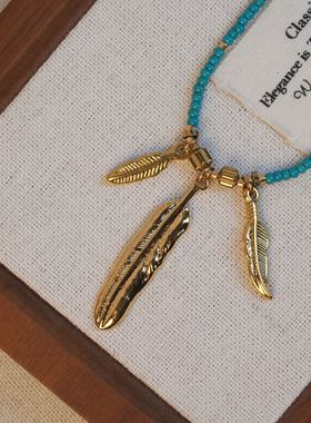 张十六铜合金羽毛串珠毛衣链