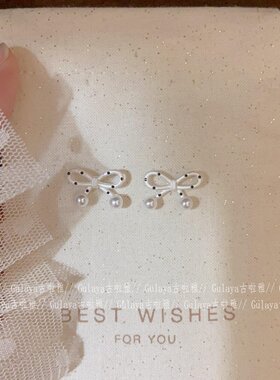 S925纯银白色波点蝴蝶结耳钉