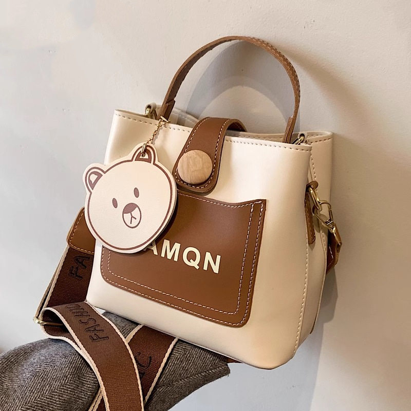 手提包小众撞色百搭通勤宽肩带斜挎包女2025春夏新款高级感水桶包,淘宝优惠券,粉丝福利购,淘宝优惠卷