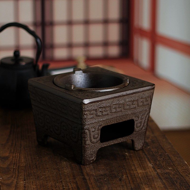 Ancient style tea ceremony cast iron charcoal stove four sacred beasts around the stove tea stove wood charcoal stove O Kung Fu tea set wind stove fire bowl cool
