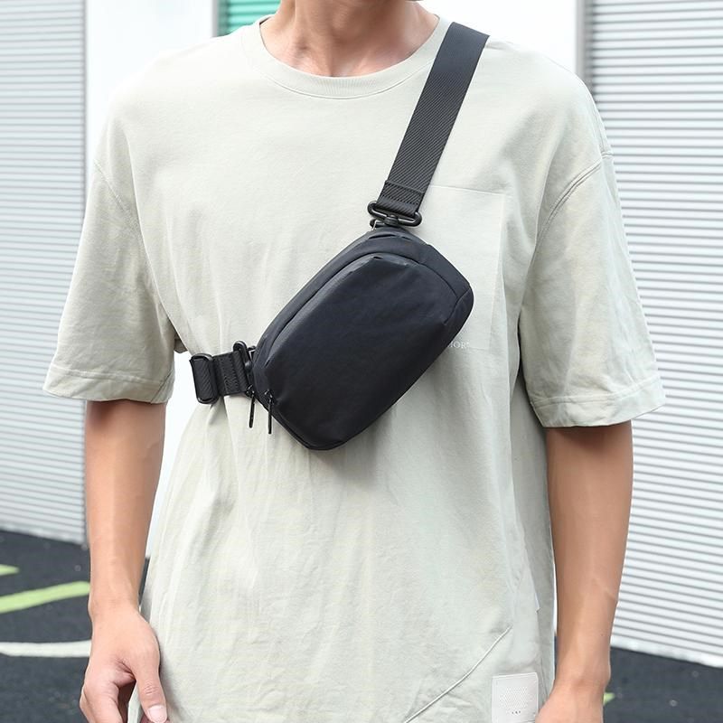 考杜拉尼龙e单肩包男士胸包户外腰包骑行双层超轻便手包磁吸扣防,淘宝优惠券,粉丝福利购,淘宝优惠卷