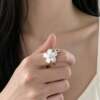 Korean small flower curled pearl ring, silver flower temperament, cute and playful, versatile index finger ring, light luxury ring