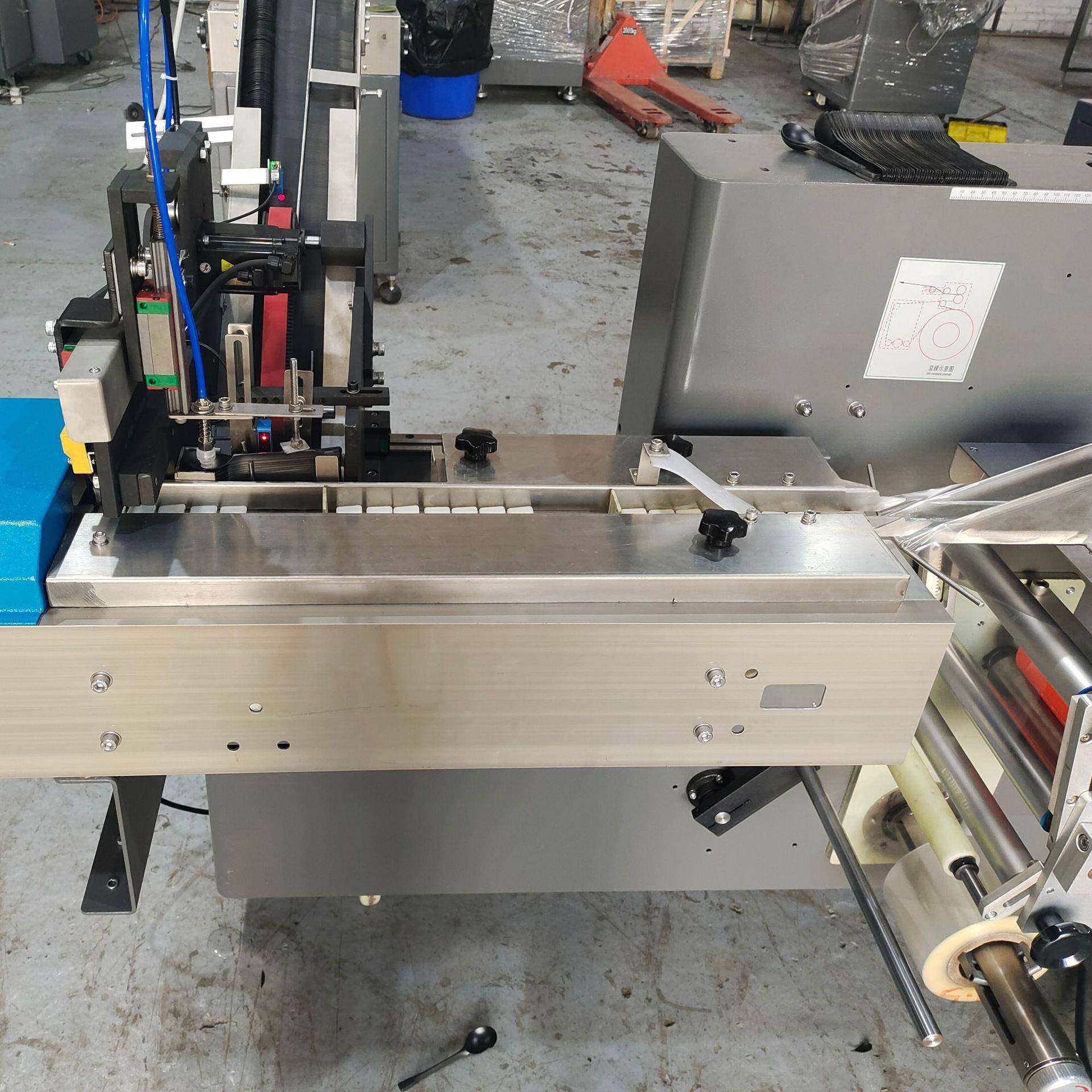 加装走膜缓冲杆膜上打孔薄膜不断膜的勺子落料器小型自动包装机械,淘宝优惠券,粉丝福利购,淘宝优惠卷