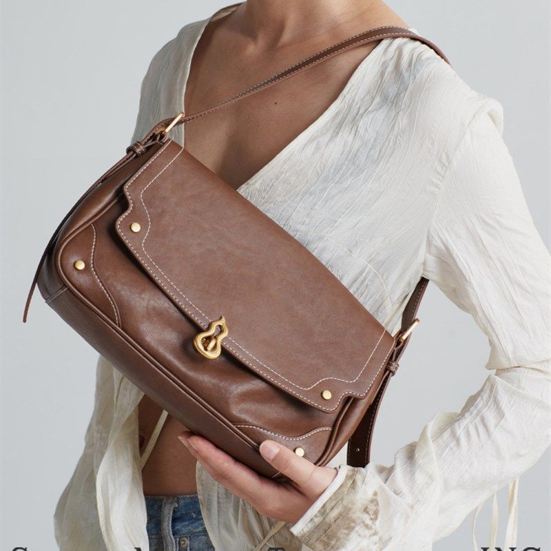 西木汀 半熟芝士 真皮单肩斜挎包包女新款小方包高级感法棍腋下包,淘宝优惠券,粉丝福利购,淘宝优惠卷