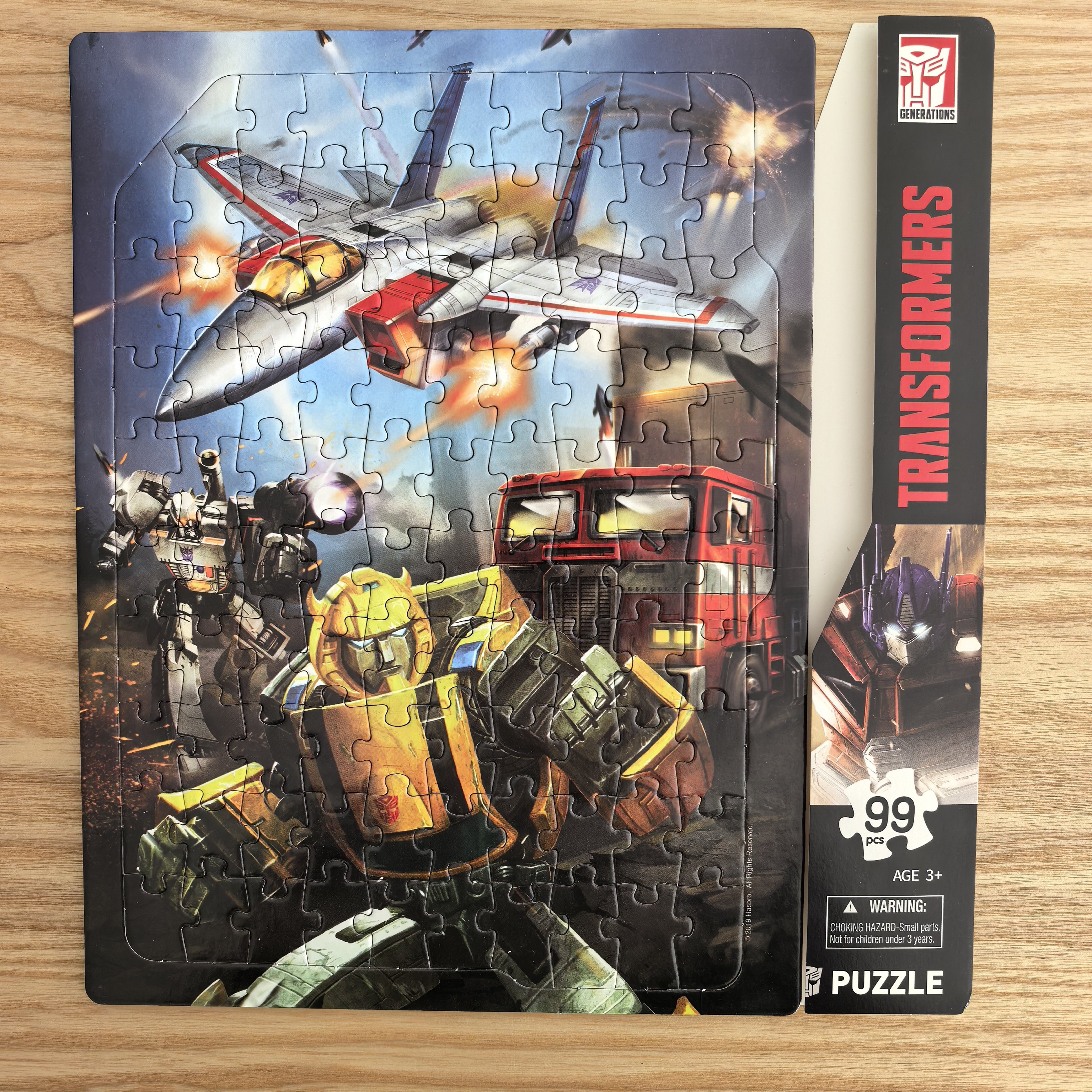 正版变形金刚拼图48/63/99片纸质拼板卡通带底框男孩儿童早教益智玩具