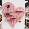 Love-shaped hole board creative entry porch wall-mounted multi-functional storage rack bedroom bedside storage wall-mounted shelf