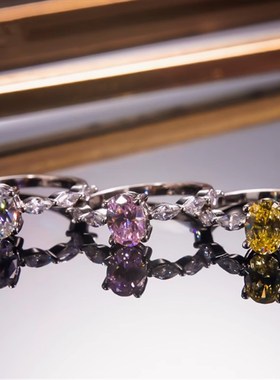 18K铂金镶嵌莫桑石椭圆鸽子蛋马眼戒指1克拉小排钻个性结婚指环女