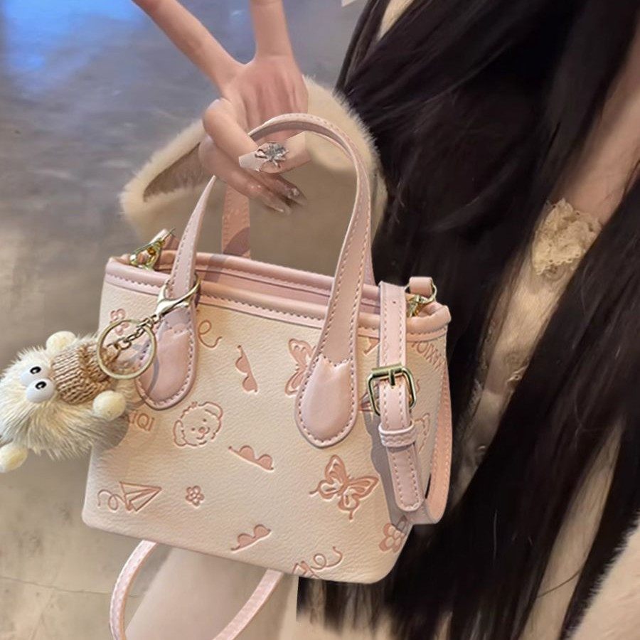 今年流行爆款小包包女春夏2025新款百搭斜挎包韩版手提迷你水桶包,淘宝优惠券,粉丝福利购,淘宝优惠卷