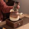 Black crystal stove for making tea around the stove, dry-fired clay teapot, pot, pot, milk tea pot, warm teapot, tea set