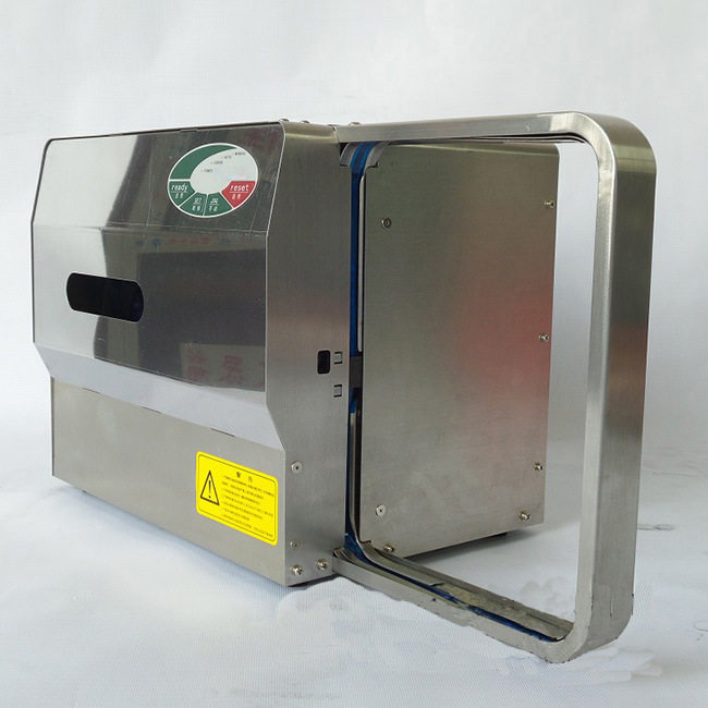 Henan side type transparent tape strapping machine OPP film tape automatic strapping machine ham sausage plastic strapping machine