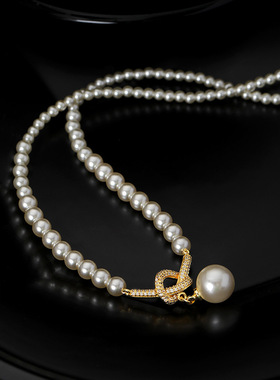 锆石打结吊坠珍珠项链女小众设计感秋冬毛衣链轻奢高级感颈链饰品