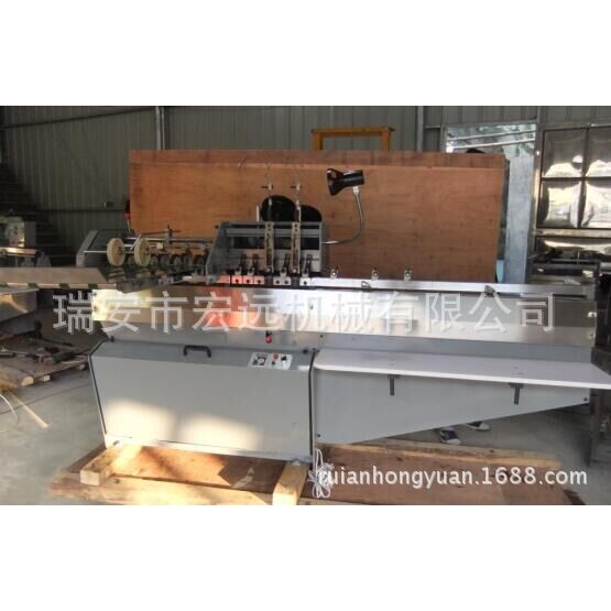 Manufacturer supplies Ruian Hongyuan DQ404-2B photoeye fully automatic saddle stitching machine, 90 orders per minute