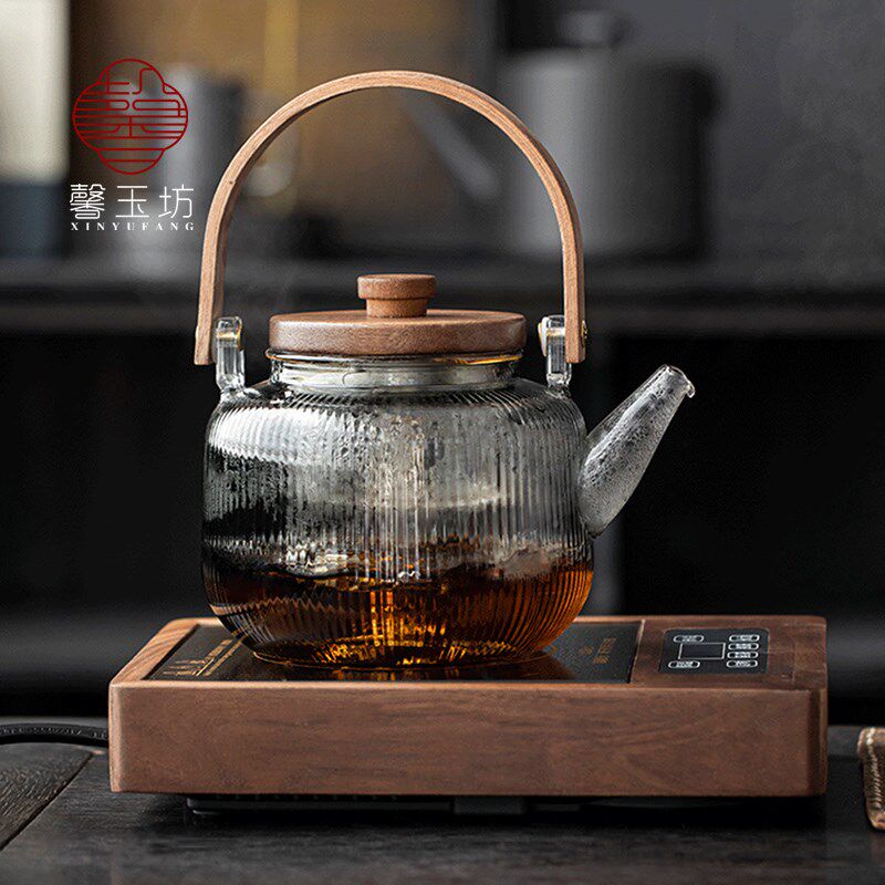 Light luxury walnut electric ceramic stove, heat-resistant glass lifting beam kettle, tea making set around the stove
