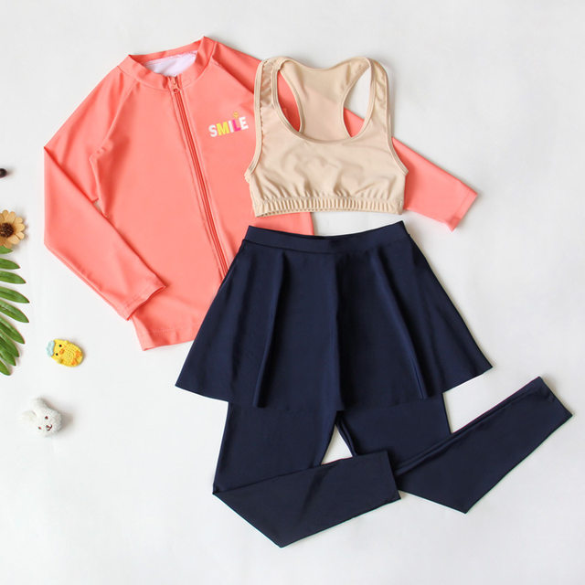 ໃຫມ່ 2026 ເດັກນ້ອຍ Skirt Split Swimsuit Cardigan ສາມສິ້ນຊຸດເສື້ອຍາວ sleeves ເດັກຍິງກາງແລະຂະຫນາດໃຫຍ່ເດັກນ້ອຍໄວຕາກແດດໃຫ້ແຫ້ງ
