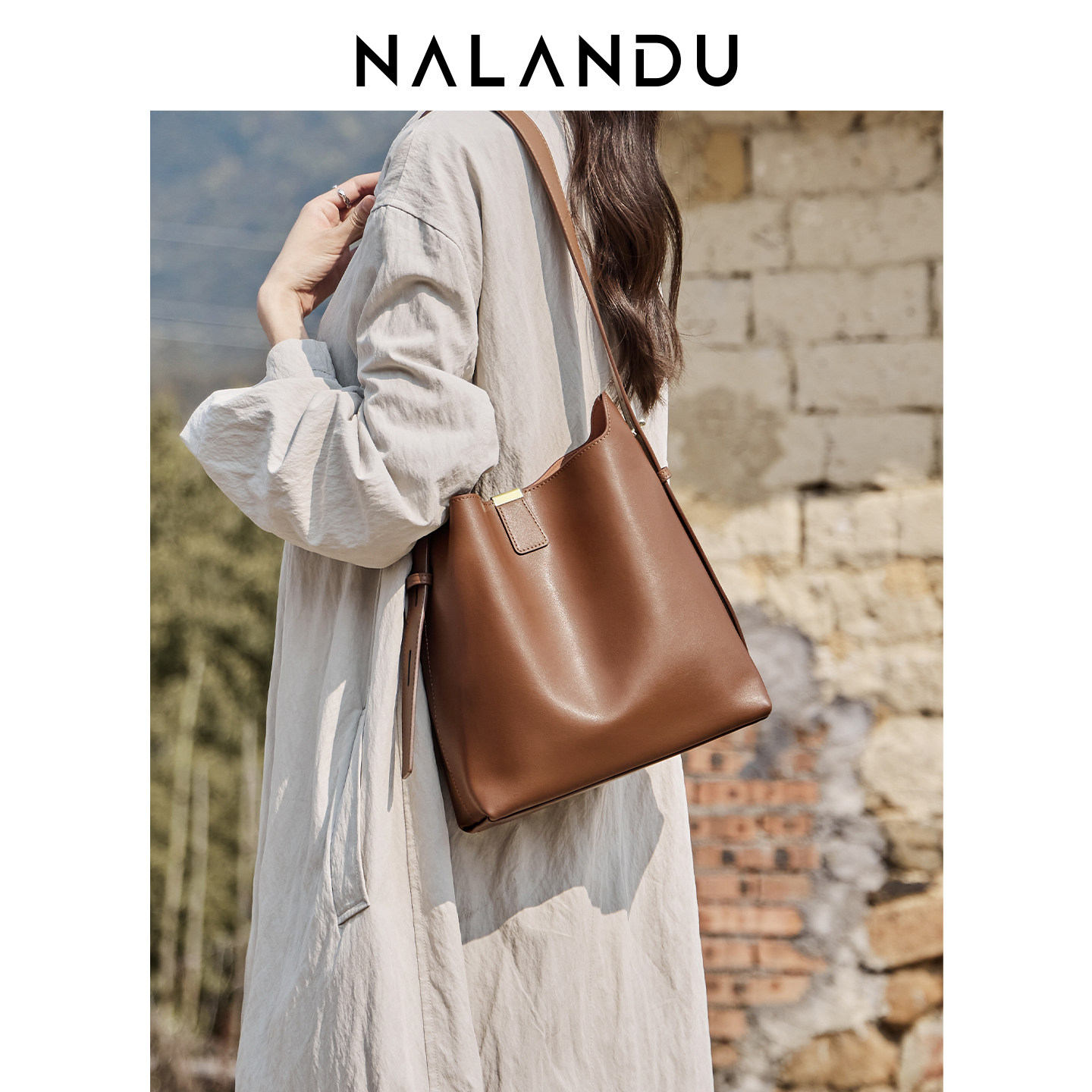 纳兰杜包包女式2025新款水桶包女款大容量通勤单肩斜挎包牛皮女包,淘宝优惠券,粉丝福利购,淘宝优惠卷