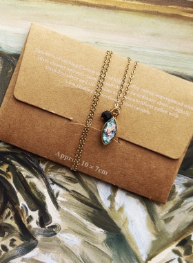 晶莹欧泊宝石镶嵌猫眼镀金项链