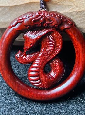 紫檀木镂空雕刻项链蛇吊坠