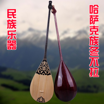 New Xinjiang instruments Kazakhs make musical instruments winter not to play the standard violin and pine wood instrument students practice