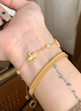 v金材质保色拉丝莺尾花手链女时尚天花板手饰品双面可戴手饰品