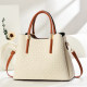 Seaside vacation woven straw bag for women 2026 new high-end contrasting color portable bucket bag single shoulder crossbody bag