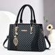 Textured and elegant women's hand-held crossbody bag 2026 new large-capacity middle-aged mother bag commuting versatile tote bag