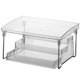 Комбинированный стол на кухне представляет собой приправные бутылочные мусоры, хранилище многофункциональные прозрачные канцелярские канцелярские товары.