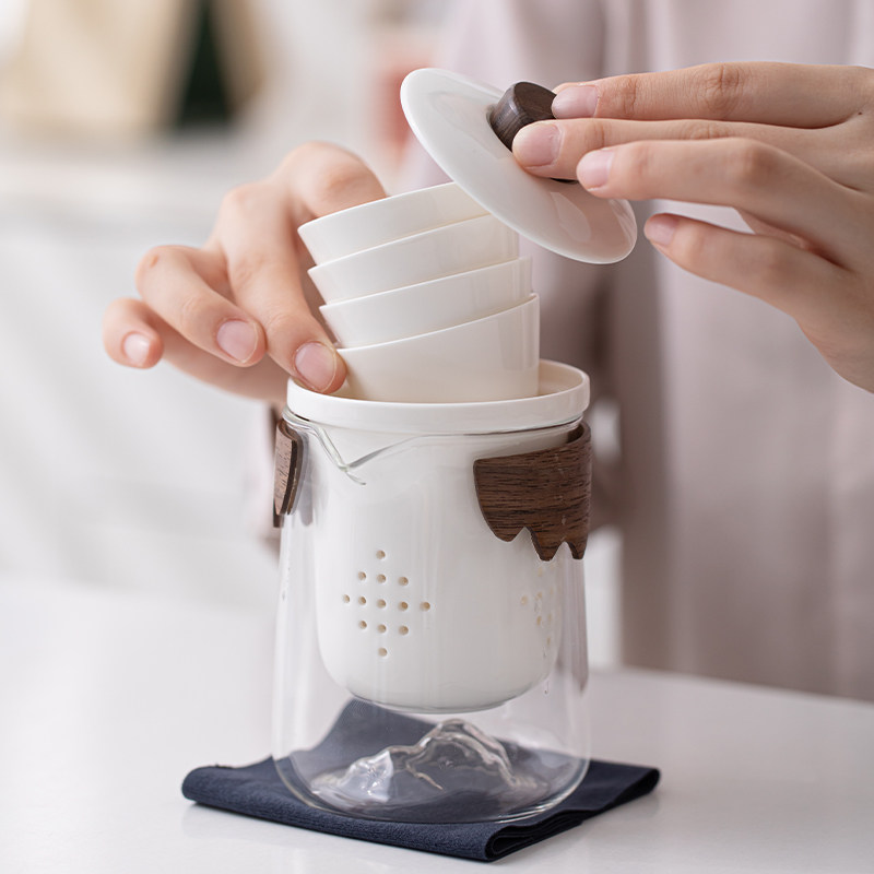 Dehua white porcelain one pot and four cups to find a trip