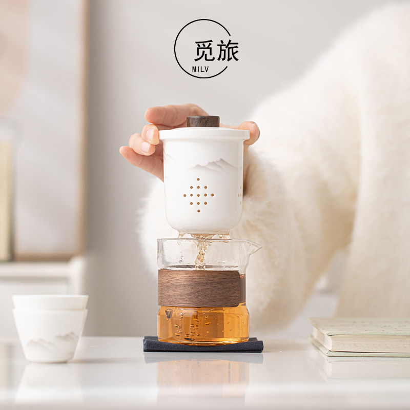 Ceramic pot and four cups travel tea set