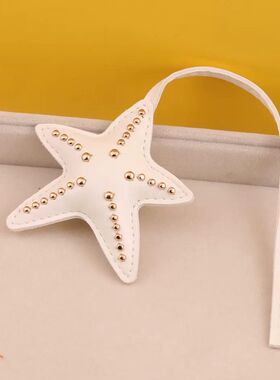 精致轻奢风白色海星包包装饰挂件金色铆钉立体充棉五角星挂绳配件