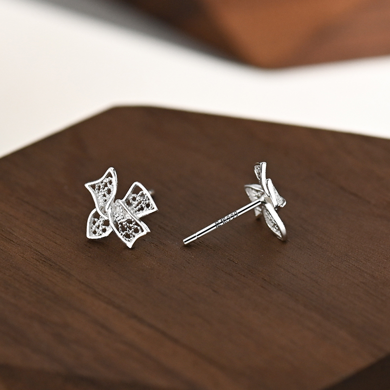 s999纯银耳钉女2025新款爆款镂空蝴蝶结耳环轻奢高级感养耳洞耳饰 - 图0