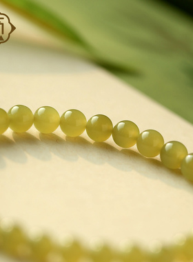 顽石灵细腻紧实收藏级且末黄和田玉圆珠单圈手串W1-45