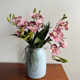 Simulated potted small bonsai with flower buds