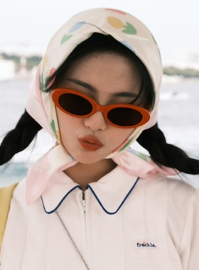 复古猫眼橘红色墨镜海边度假女