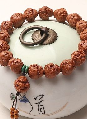 野生秦岭龙纹桃核手串