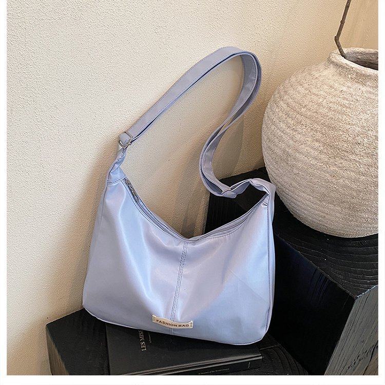 高级感包包女士2025新款潮时尚简约休闲单肩包上课通勤斜挎饺子包,淘宝优惠券,粉丝福利购,淘宝优惠卷