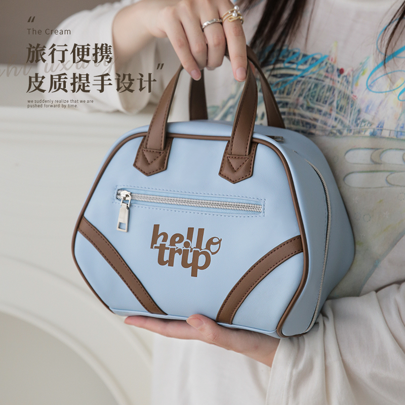 化妆包女2025新款高端便携大容量手提化妆品收纳包分区洗漱包外出