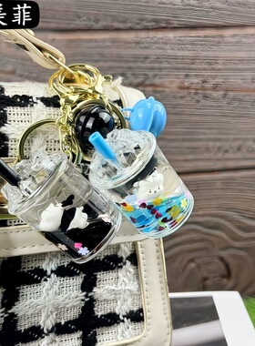 卡通可爱入油公仔开飞机钥匙扣精致液体流沙瓶挂件小礼物包包挂饰