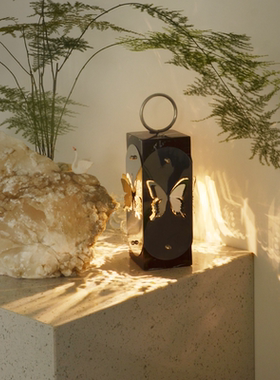 现代简约样板间卧室床头柜台面创意手提台灯摆件ins氛围灯光装饰