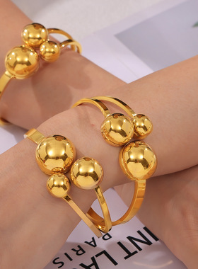 时尚跨境新款钛钢大小圆圈镂空手镯弹簧开口个性设计款轻奢手饰女