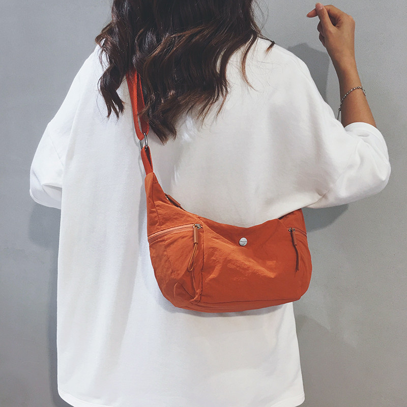 Linglan six-color simple and fashionable canvas cross-body dumpling bag