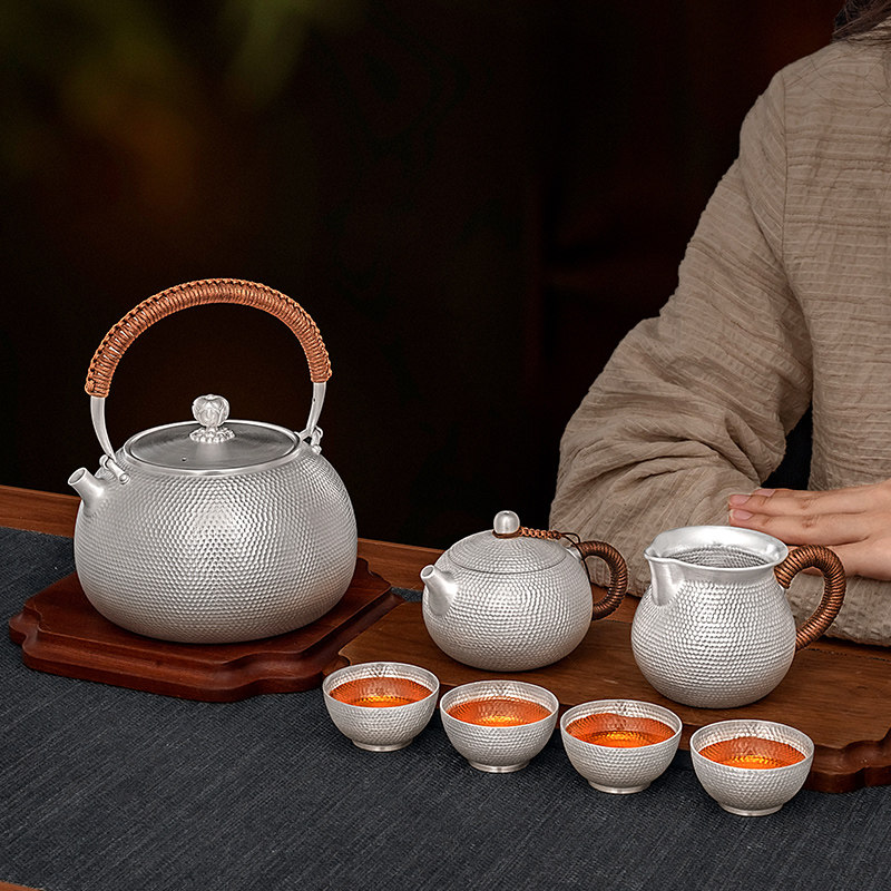 Silver Age handmade hammered kettle and tea set