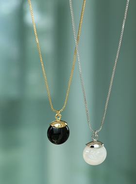 黑白棋子。精致黑玛瑙白贝圆形吊坠金银色长项链耳钩简约时髦百搭