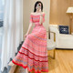 Printed holiday style waist-cinching one-shoulder long dress