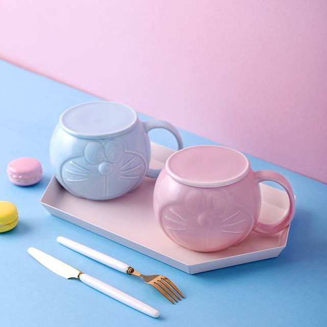 Female ceramic cartoon of Situ Mo's same cup when he was a child