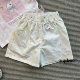 DZ25293 желтые шорты с рисунком
