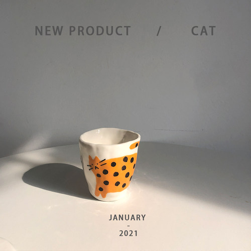 旷野呼告| 原创手捏不规则手握杯橘猫黄猫设计手作小众咖啡杯 - 图0