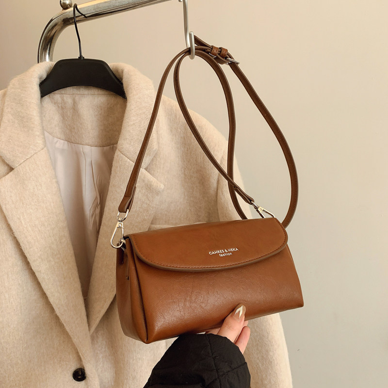 香港品牌真皮包包女2026秋冬新款高级感气质通勤复古单肩斜挎小包,淘宝优惠券,粉丝福利购,淘宝优惠卷