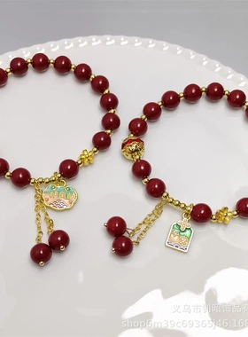 新中式国潮钻球招财纳福手链设计感金色桃花静心本命年朱砂色手串