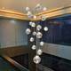 Staircase chandelier, hollow lava lamp, post-modern high-end feel