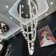 Crystal chandelier in hotel lobby, large chandelier in empty living room